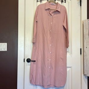 Solid pink dress the buttons all down the front.